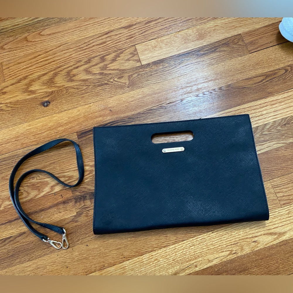 Michael Kors large clutch in black. Good used condition